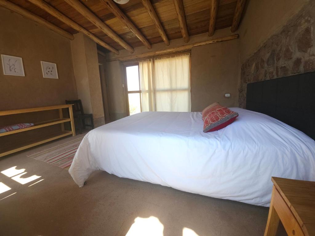 Postel nebo postele na pokoji v ubytování Pampachayoq - Mountain retreat
