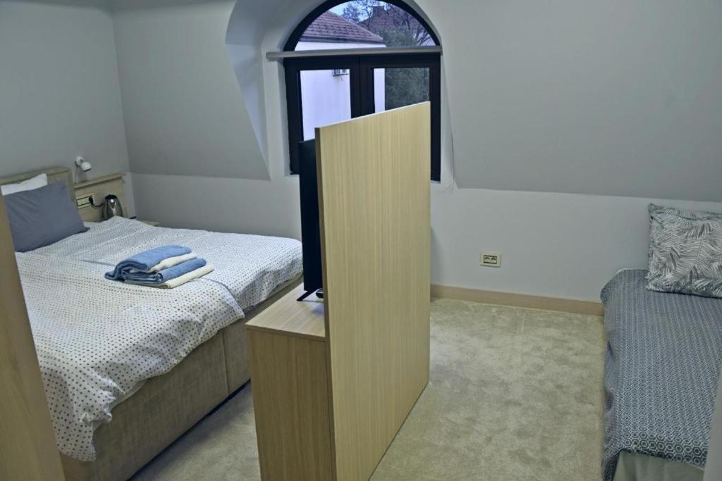 Postel nebo postele na pokoji v ubytování City SMART
