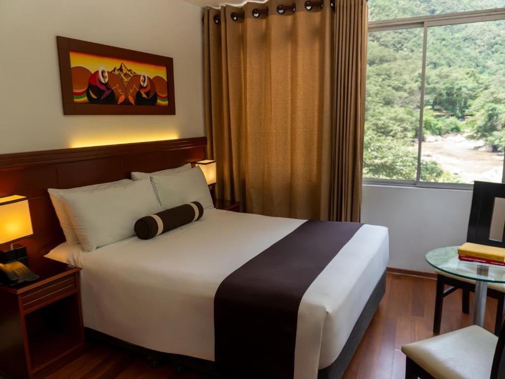 Voodi või voodid majutusasutuse Hotel Ferré Machu Picchu toas