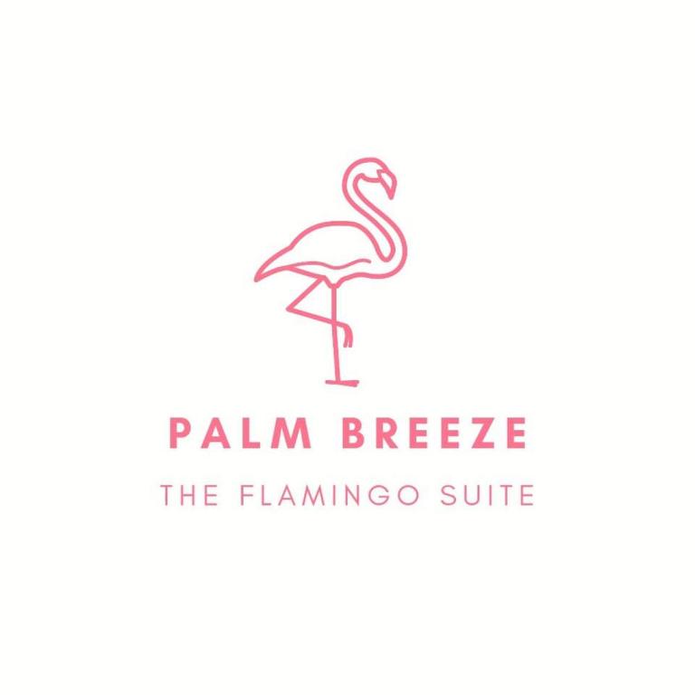 a flamingo logo for a flamingo restaurant at The Flamingo Suite 1 King in Columbia