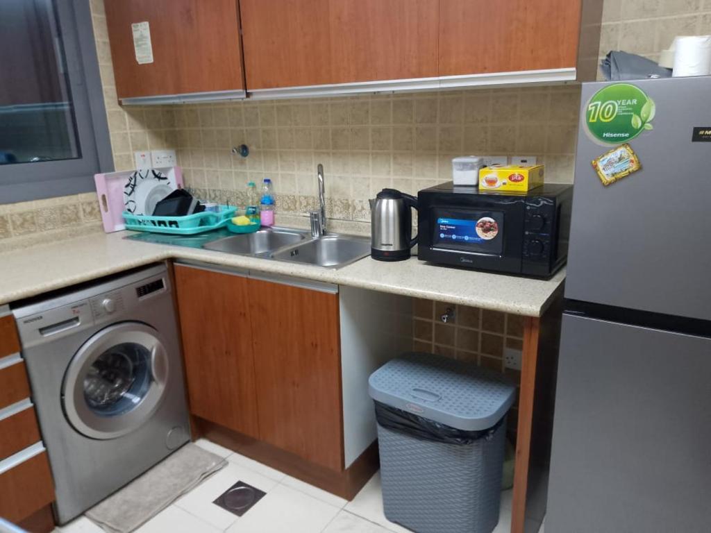Kuchyň nebo kuchyňský kout v ubytování Top House Hostel