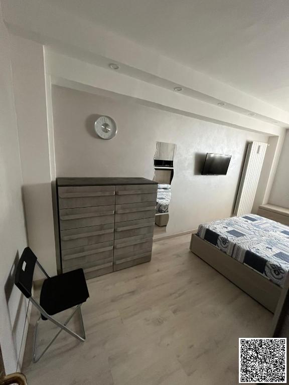 Postel nebo postele na pokoji v ubytování Domus Teresae