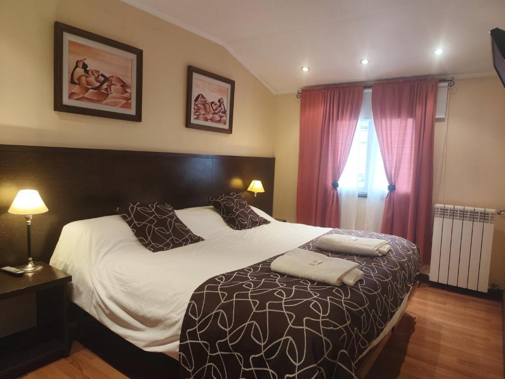 Postel nebo postele na pokoji v ubytování Las Retamas B&B