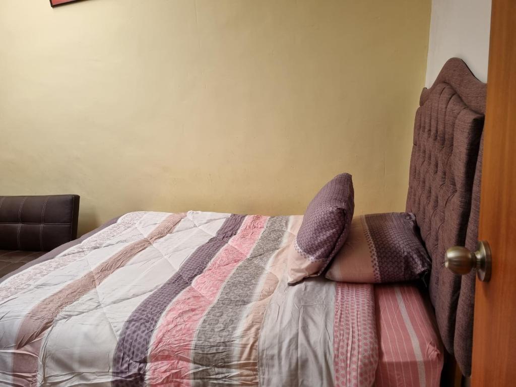 Postel nebo postele na pokoji v ubytování La Casa de Laura - Plaza
