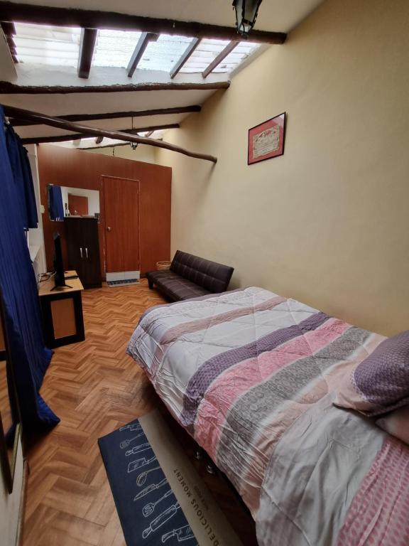 Postel nebo postele na pokoji v ubytování La Casa de Laura - Plaza