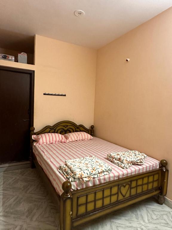 Postel nebo postele na pokoji v ubytování GVQ Nest 101