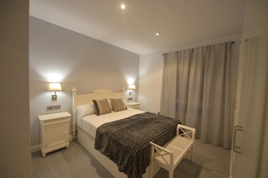 Postel nebo postele na pokoji v ubytování Apartamento Victoria
