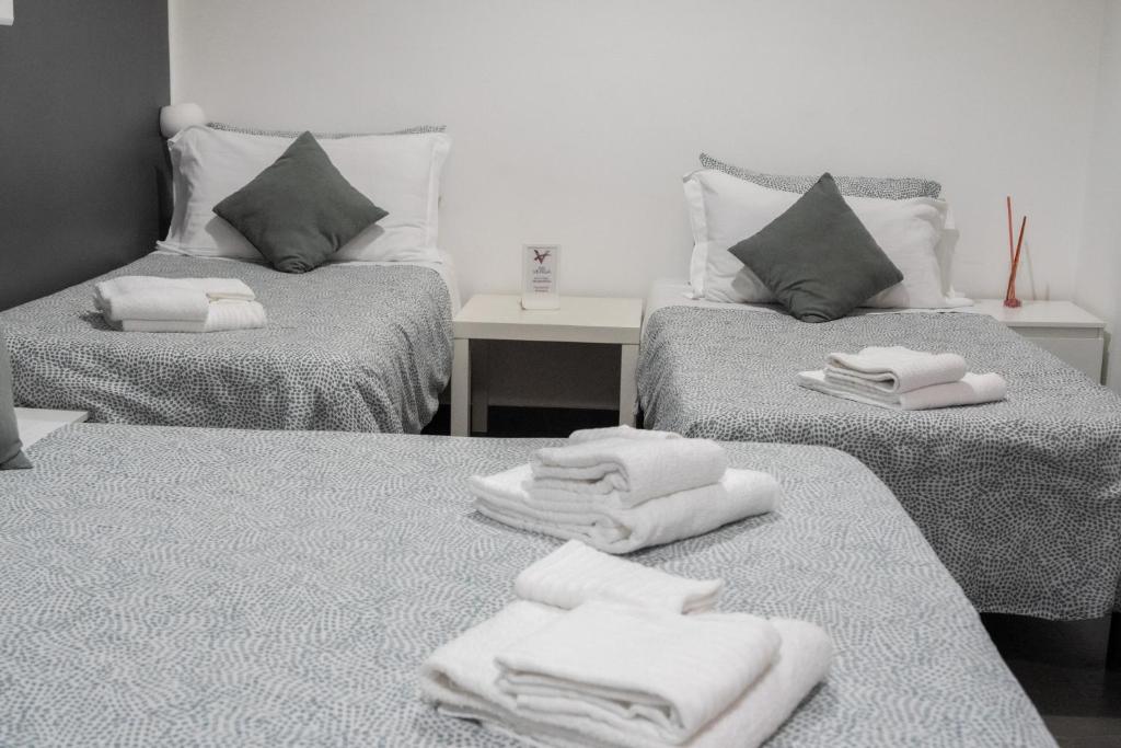 A bed or beds in a room at B&B Verga