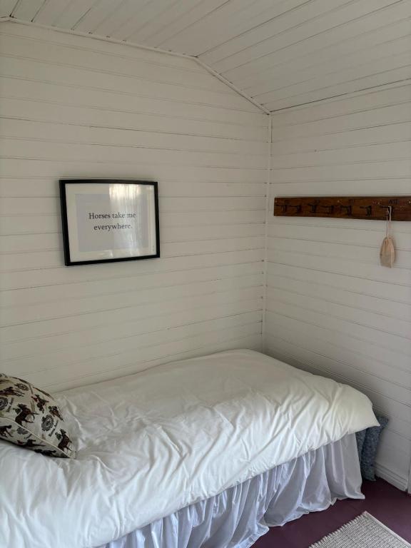 Postel nebo postele na pokoji v ubytování Arphus Lodge