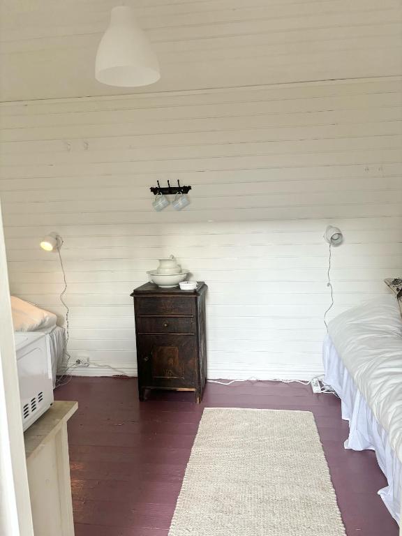 Postel nebo postele na pokoji v ubytování Arphus Lodge