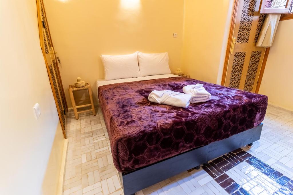 Postel nebo postele na pokoji v ubytování Riad Batha