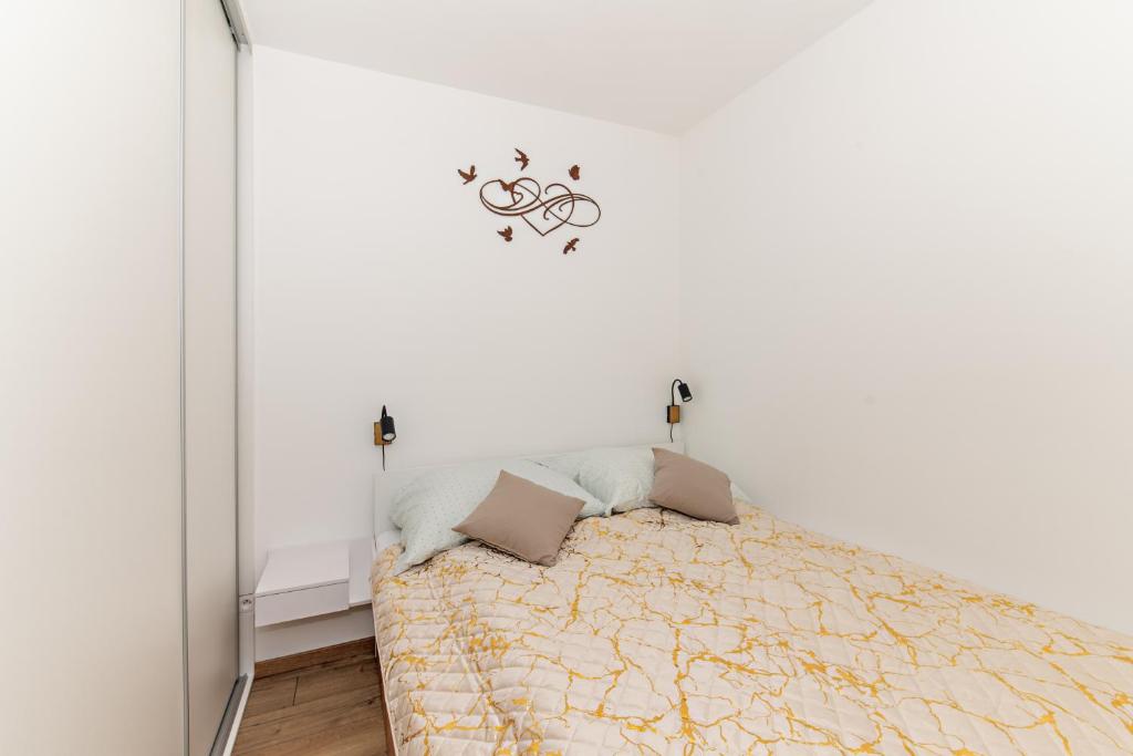 Postel nebo postele na pokoji v ubytování Apartmán Jeannine