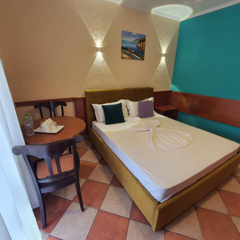 Postel nebo postele na pokoji v ubytování My Rooms Hotel