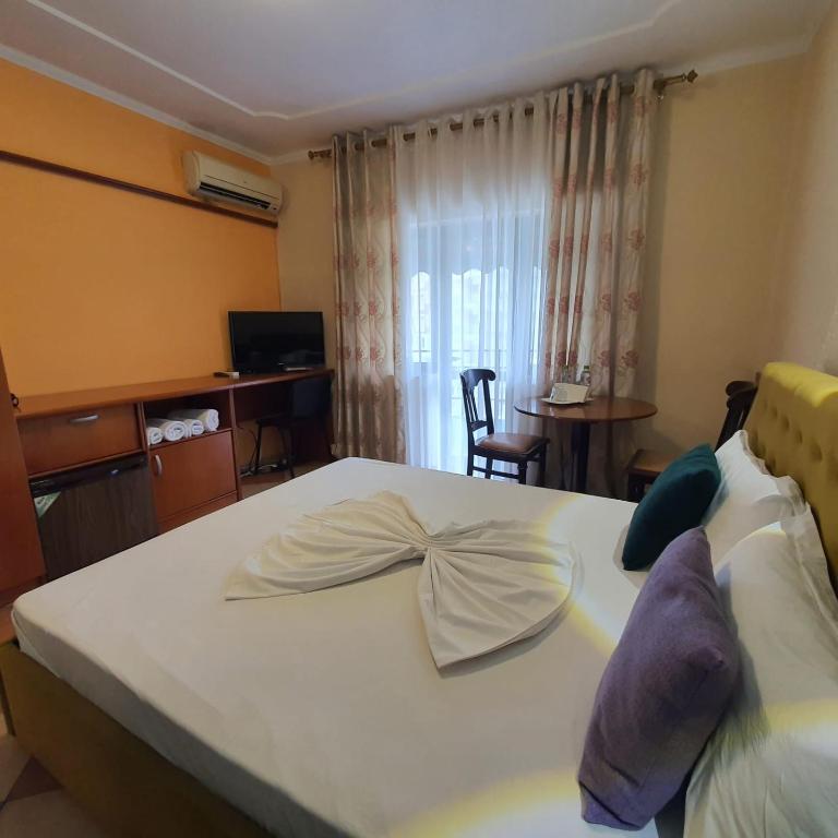 Postel nebo postele na pokoji v ubytování My Rooms Hotel