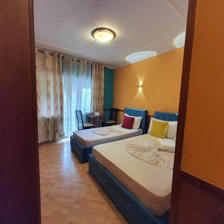 Postel nebo postele na pokoji v ubytování My Rooms Hotel
