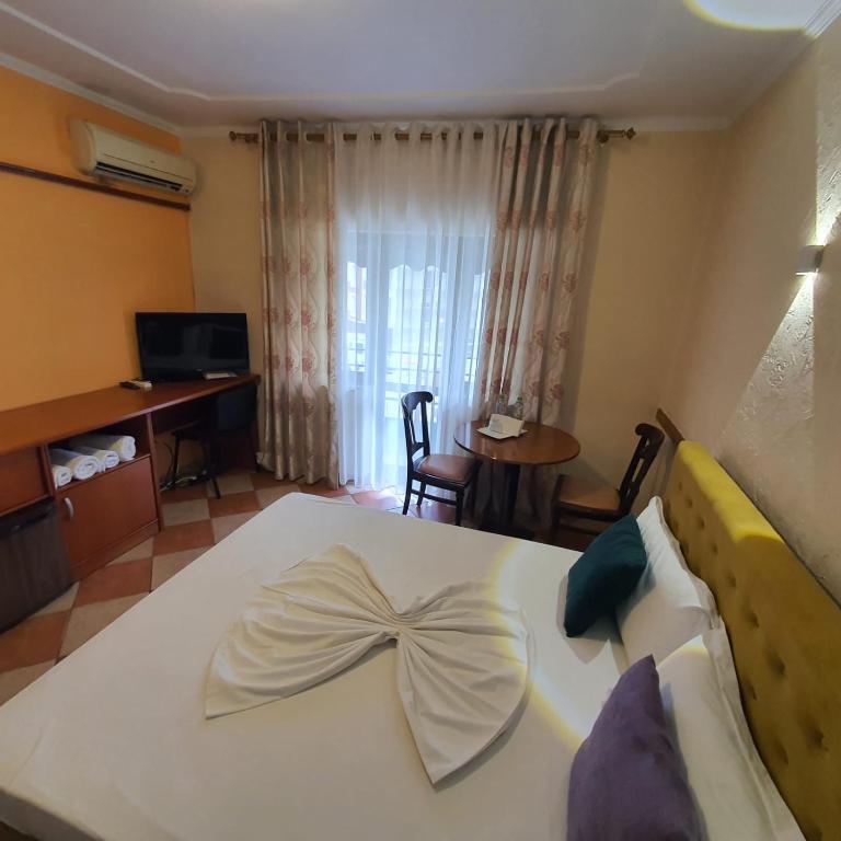 Postel nebo postele na pokoji v ubytování My Rooms Hotel