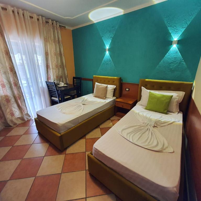 Postel nebo postele na pokoji v ubytování My Rooms Hotel