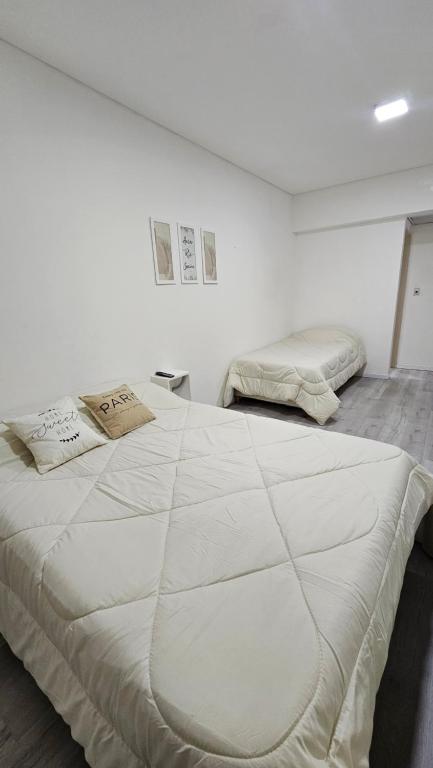 Postel nebo postele na pokoji v ubytování Departamento en Microcentro a pasos del Obelisco