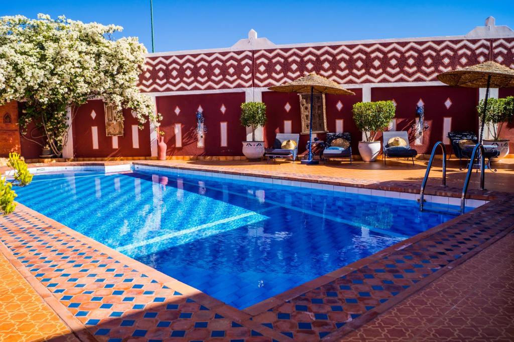 Bazén v ubytování Le Petit Riad Maison d'hôtes nebo v jeho okolí