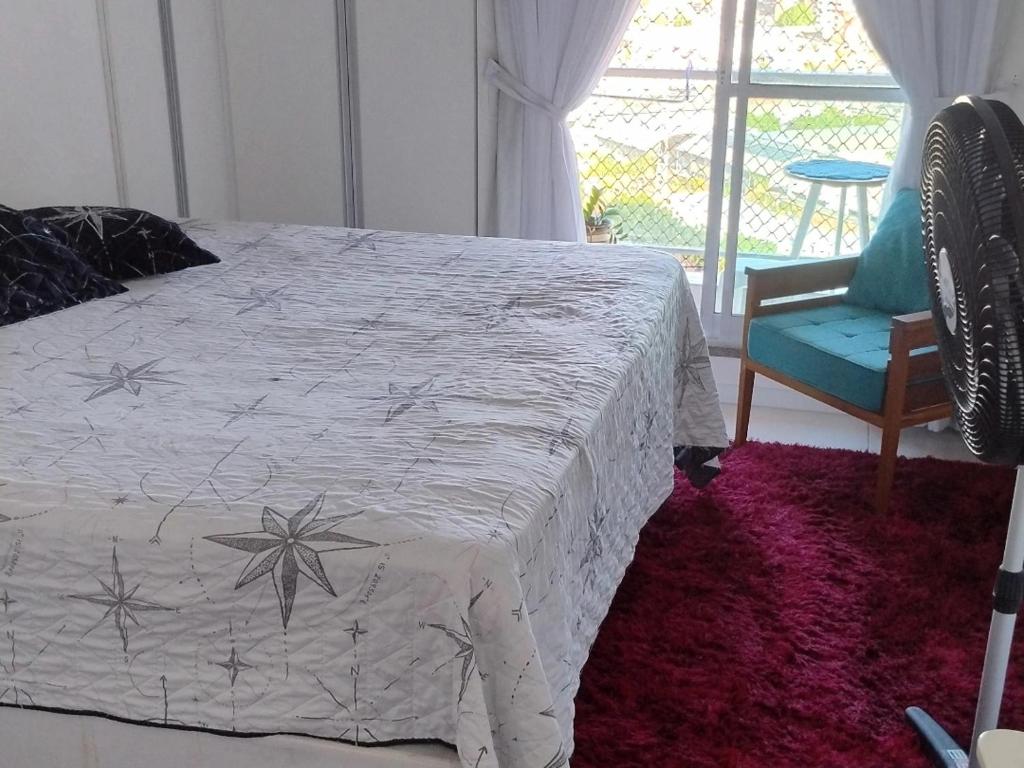 Postel nebo postele na pokoji v ubytování Quartos - Cíntia
