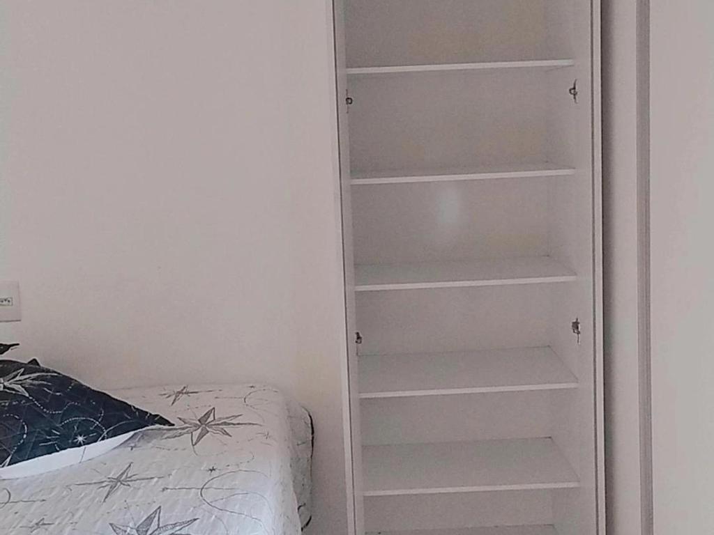 Postel nebo postele na pokoji v ubytování Quartos - Cíntia