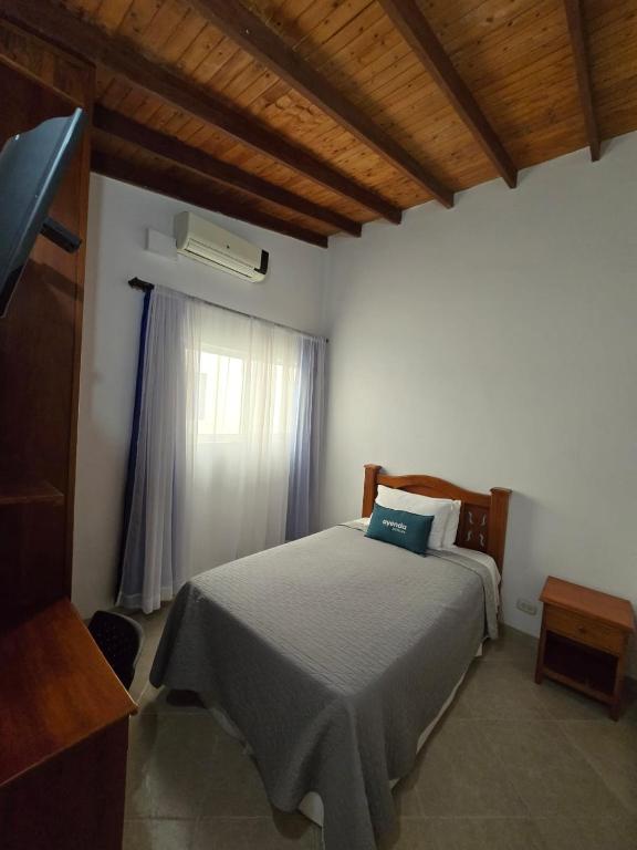 Postel nebo postele na pokoji v ubytování Ayenda Torre 2