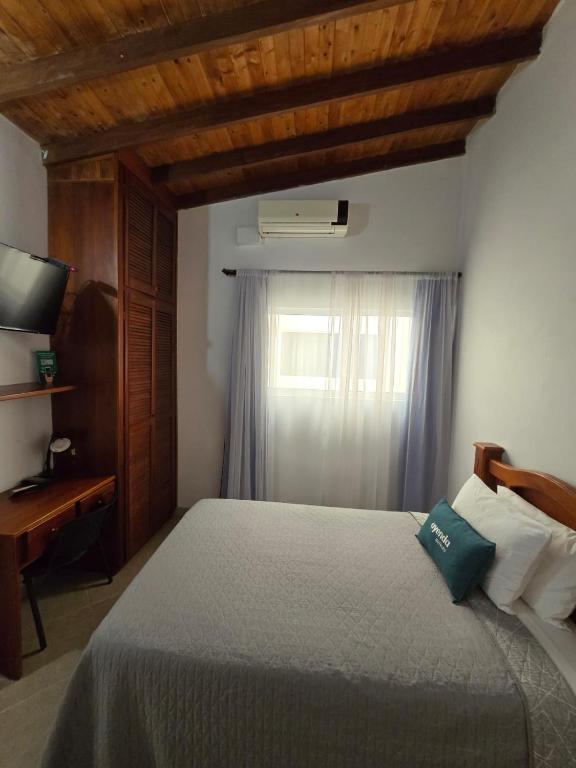 Postel nebo postele na pokoji v ubytování Ayenda Torre 2