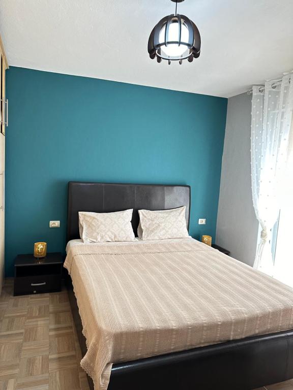 Postel nebo postele na pokoji v ubytování Albanian Oasis