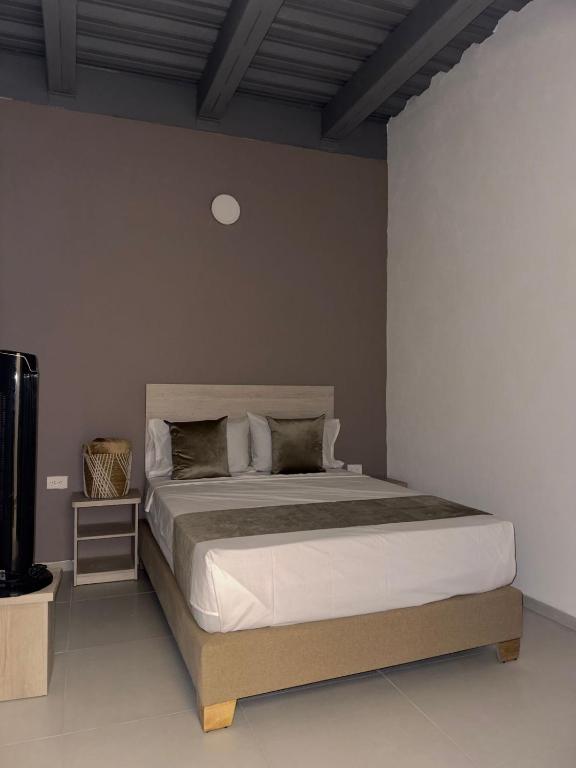 Postel nebo postele na pokoji v ubytování Hotel Med Llanogrande