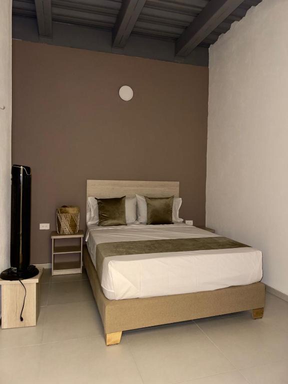 Postel nebo postele na pokoji v ubytování Hotel Med Llanogrande