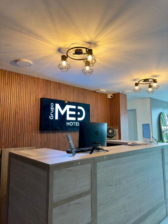 TV a/nebo společenská místnost v ubytování Hotel Med Llanogrande