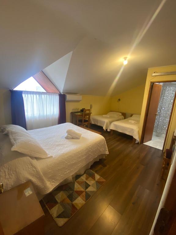Cama ou camas em um quarto em Hotel Küyen-Ko Pucón