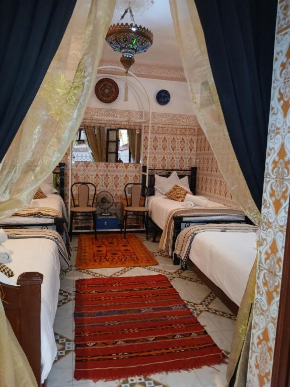 Postel nebo postele na pokoji v ubytování Dar Margot Marrakech