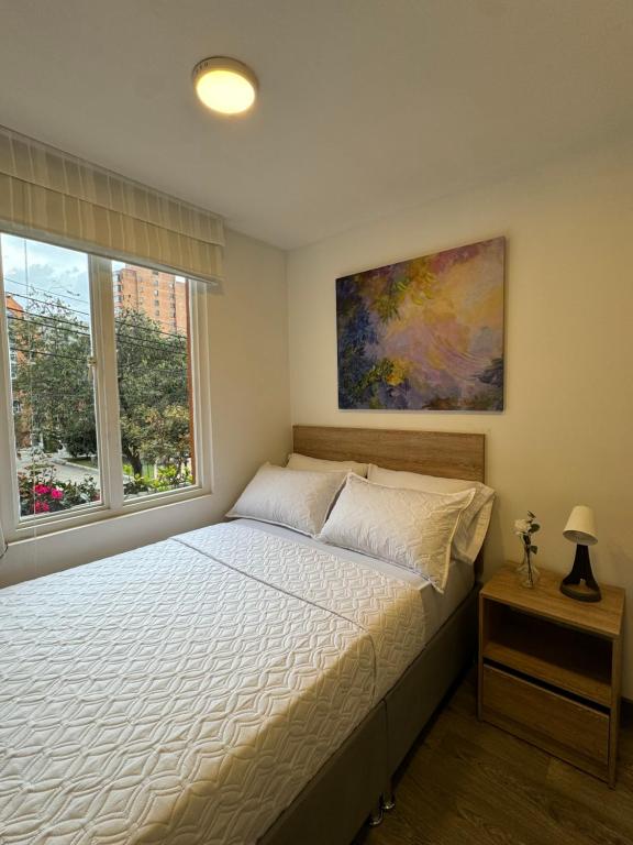 Postel nebo postele na pokoji v ubytování Hostelfc Javeriana