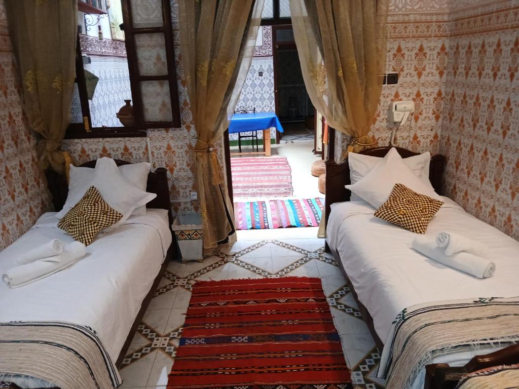 Postel nebo postele na pokoji v ubytování Dar Margot Marrakech