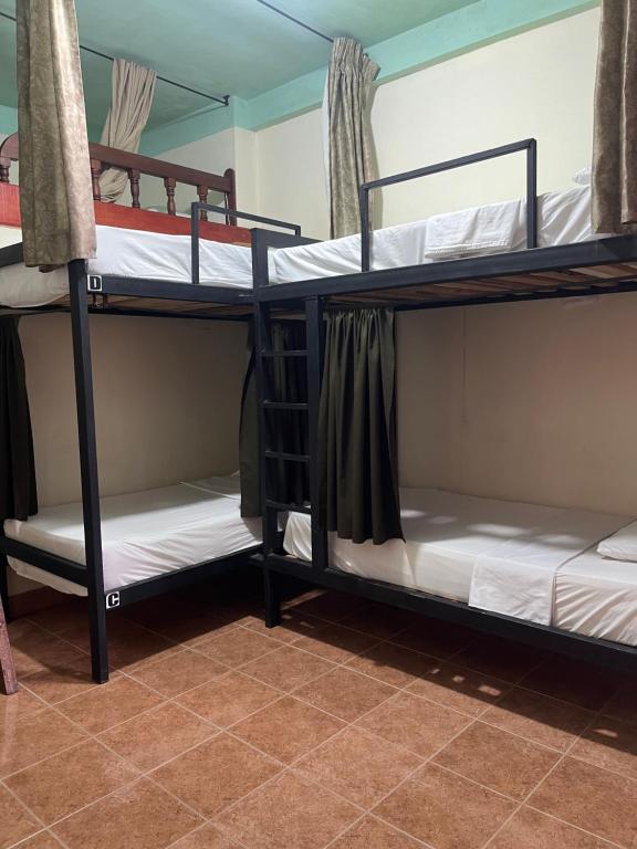 Postel nebo postele na pokoji v ubytování Candileja hostel
