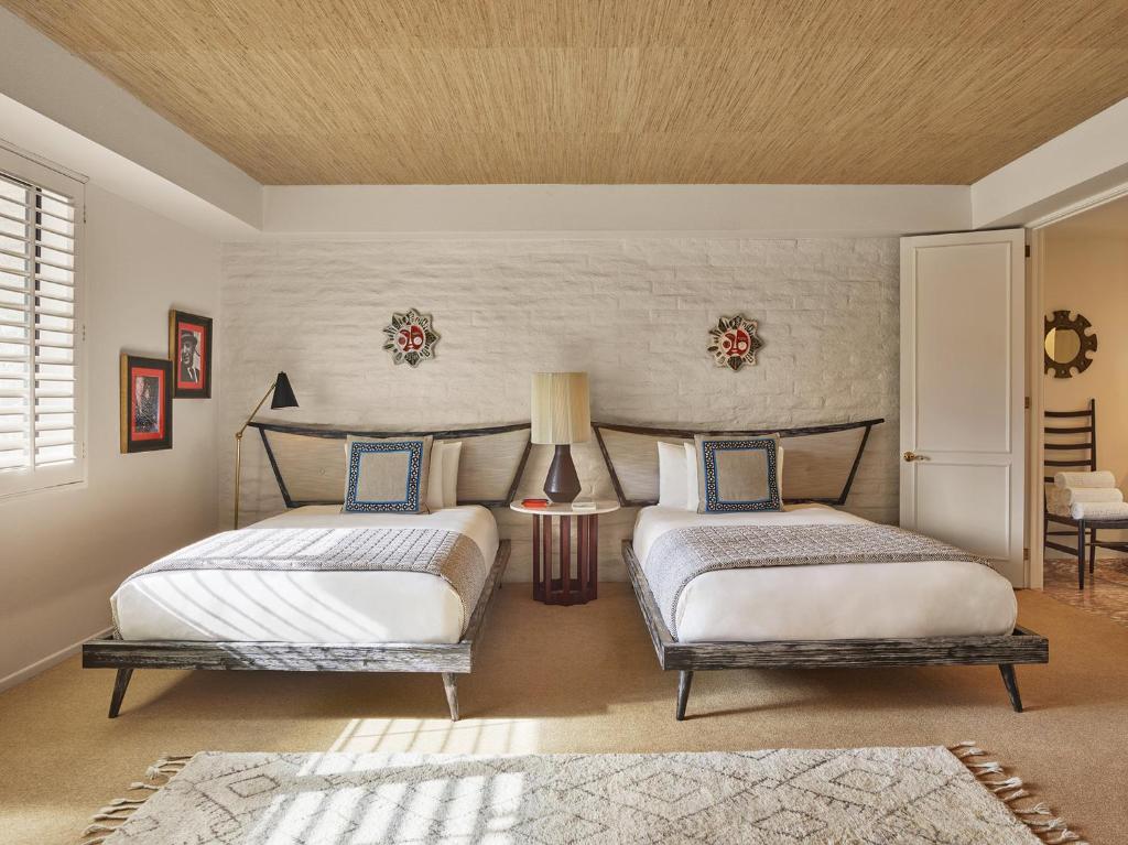 Postel nebo postele na pokoji v ubytování Parker Palm Springs