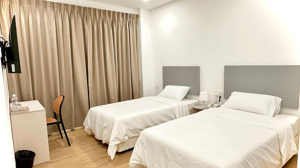 Postel nebo postele na pokoji v ubytování Lawson Inn