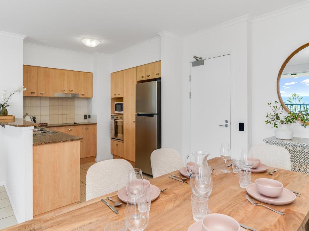 Kuchyň nebo kuchyňský kout v ubytování Alex Beachfront Apartment