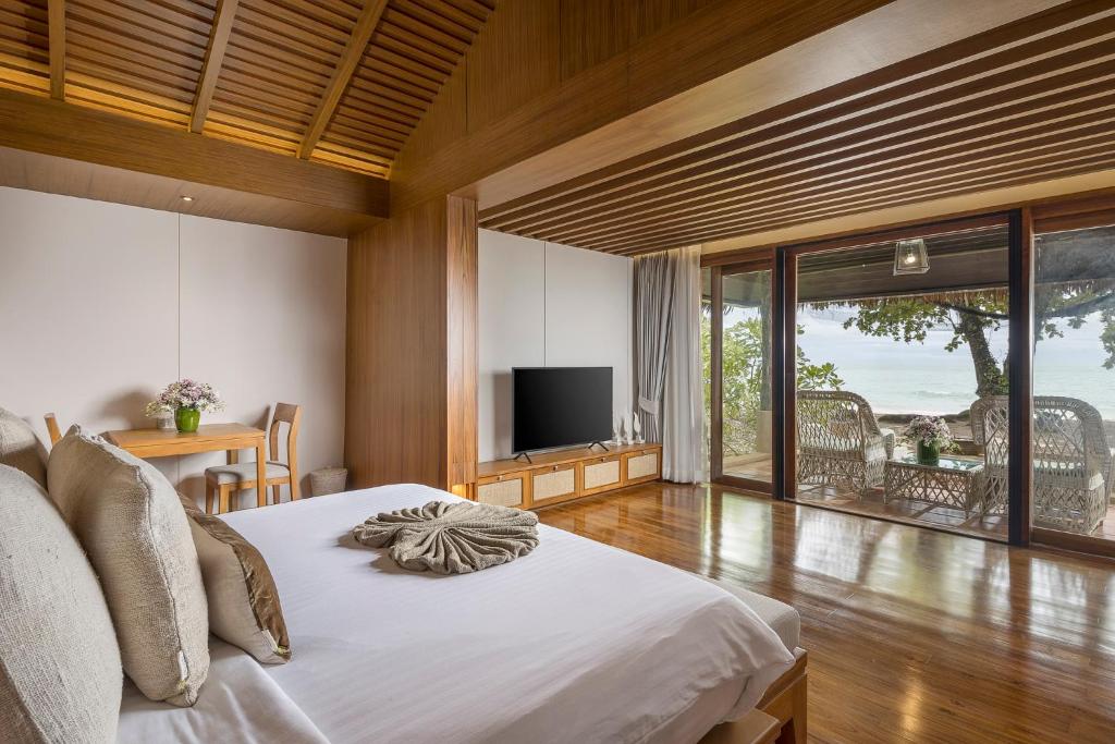 Postel nebo postele na pokoji v ubytování Khaolak Paradise Resort