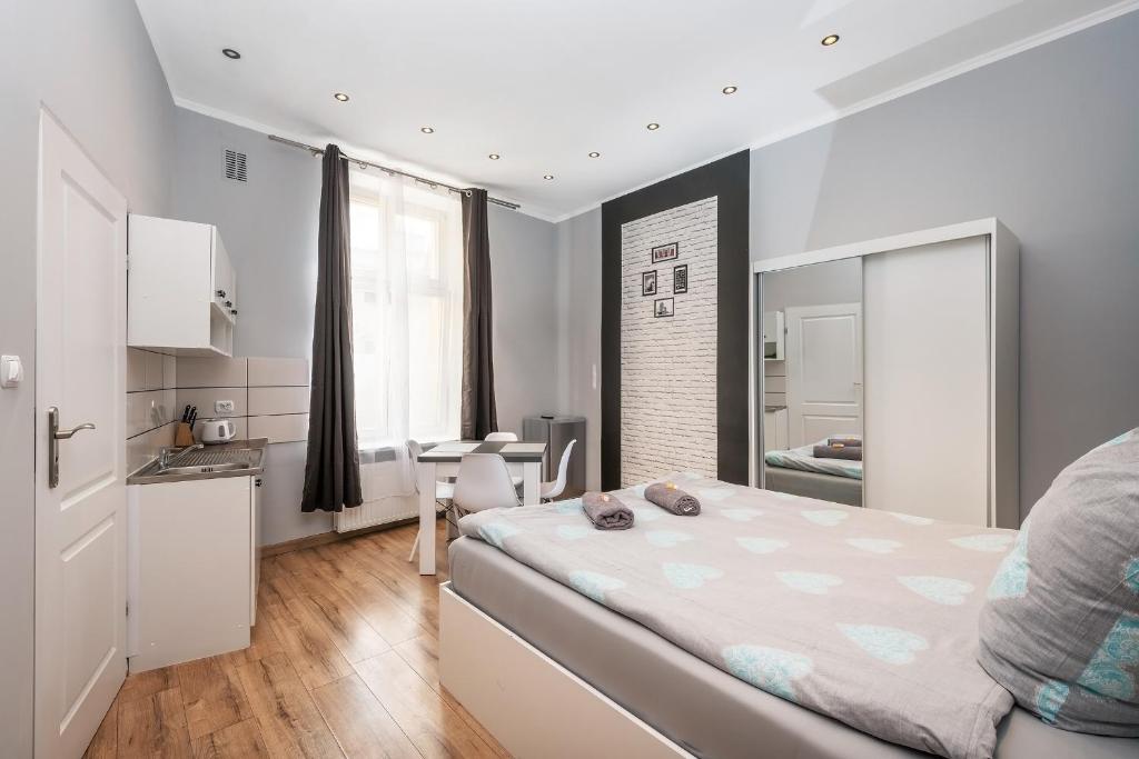Posteľ alebo postele v izbe v ubytovaní 70s Guest room