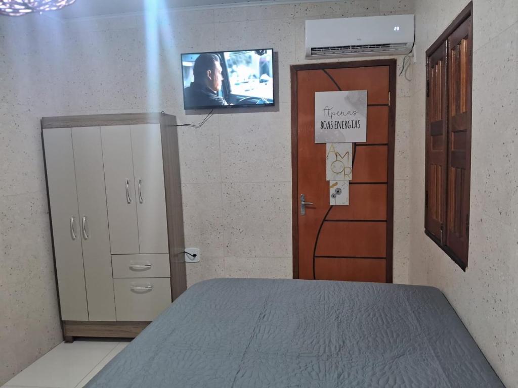 Postel nebo postele na pokoji v ubytování flat do anderson morro de são paulo