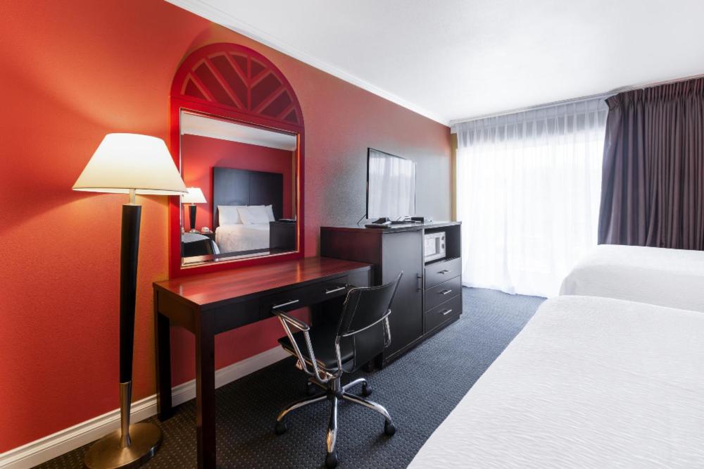 TV a/nebo společenská místnost v ubytování Pullman Garden Inn