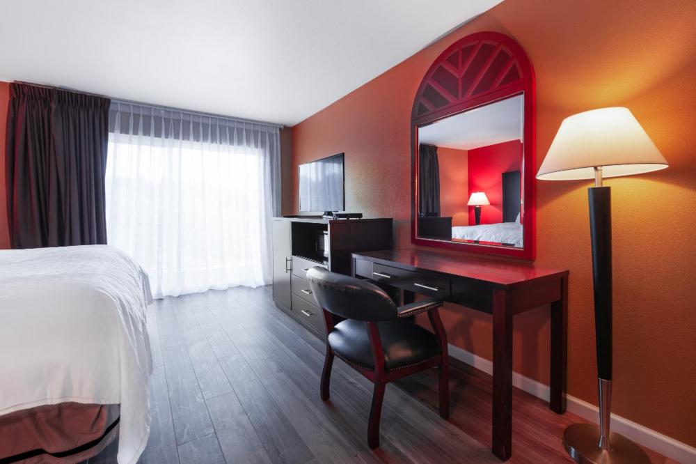 Postel nebo postele na pokoji v ubytování Pullman Garden Inn