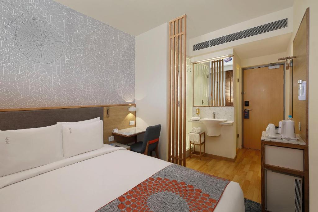 Koupelna v ubytování Holiday Inn Express Ahmedabad Prahlad Nagar by IHG
