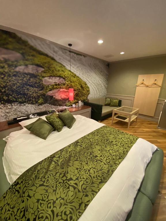 Postel nebo postele na pokoji v ubytování ホテル郷GO男塾ホテルグループAdult Only