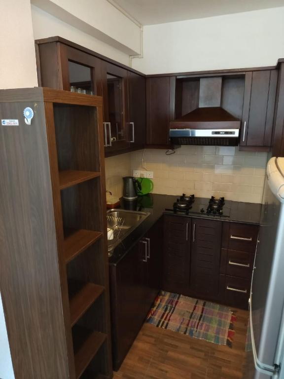 Kuchyň nebo kuchyňský kout v ubytování Nuwara eliya Luxury Apartment