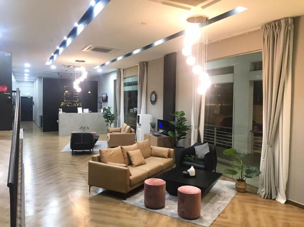 Posezení v ubytování Enclave Business Hotel