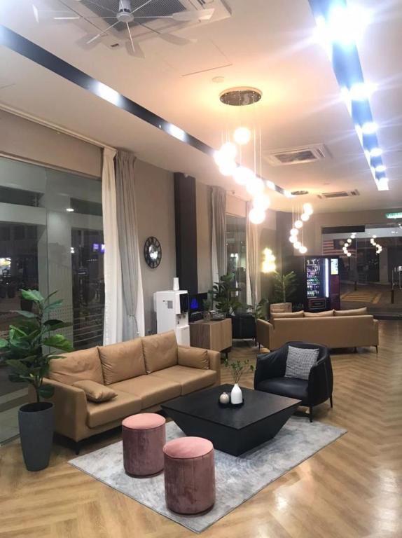 Posezení v ubytování Enclave Business Hotel