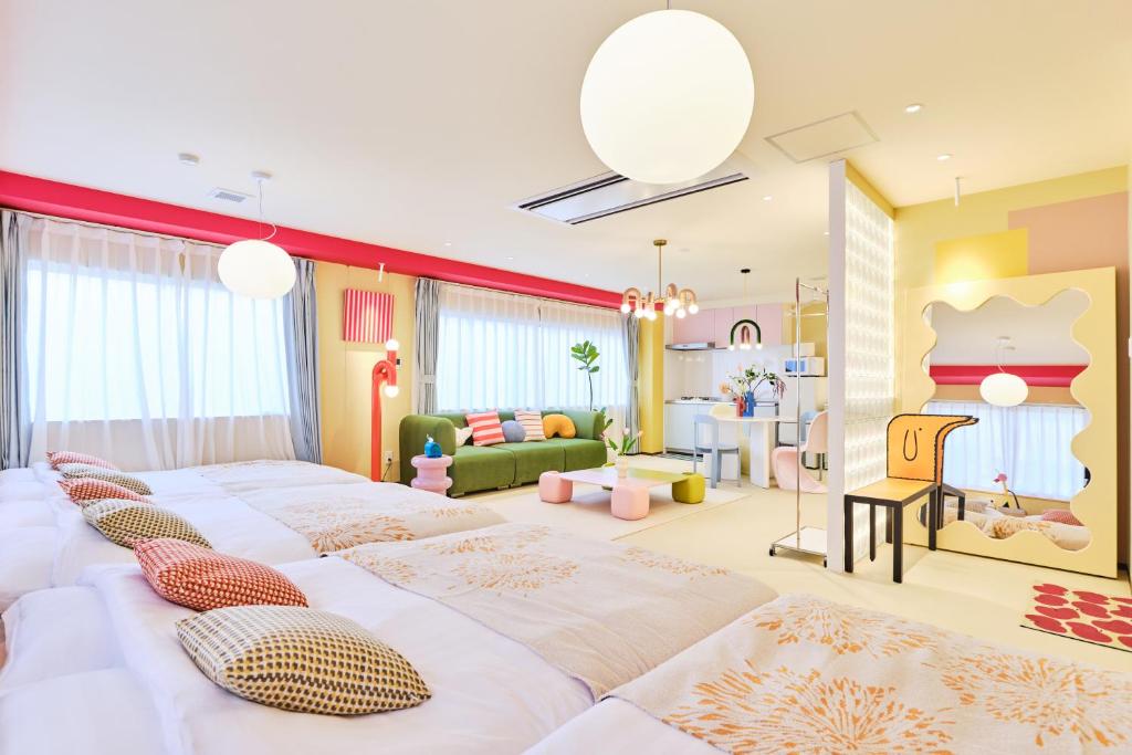 Postel nebo postele na pokoji v ubytování 寅ホテル 御徒町 TORA HOTEL Okachimachi